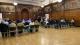 Group of people enjoying a musical concert in Fyvie Hall