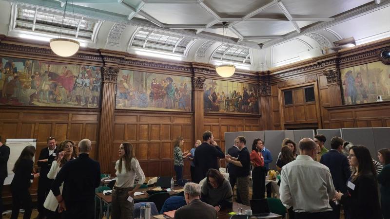 Delegates of the Fossil Fuel Symposium mingle in Fyvie Hall