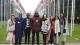 International Development Management MSc students pose in front of the flags at the UN in Geneva