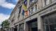 LGBTQ flag flying on Regent Campus facade