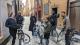 A group of students on bicycles in the streets of Stockholm. 