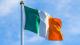 Irish flag on pole waving in the wind