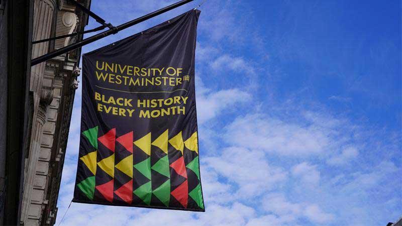 Black History Year flag on Regent campus facade