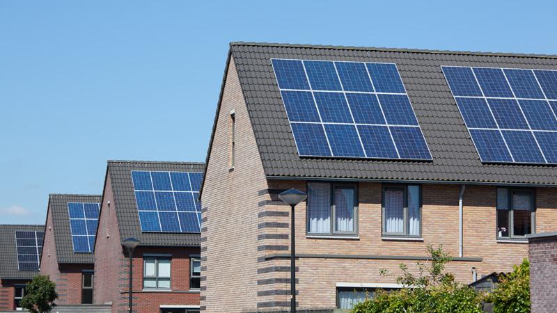 Block of houses with solar panels on roof