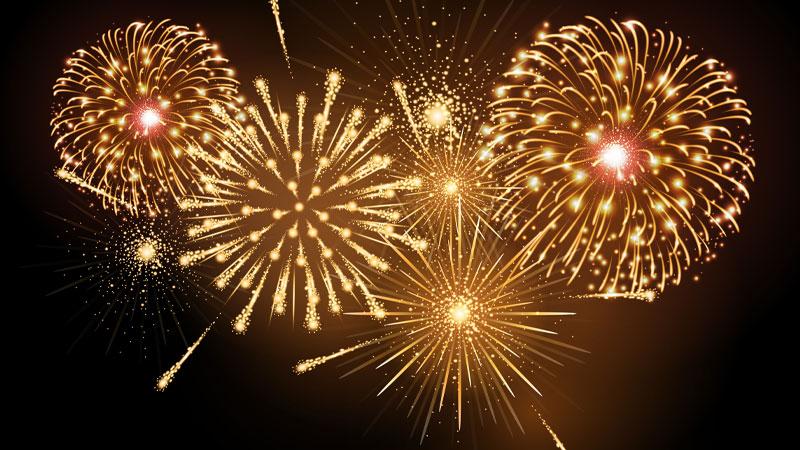 Gold fireworks on a black background